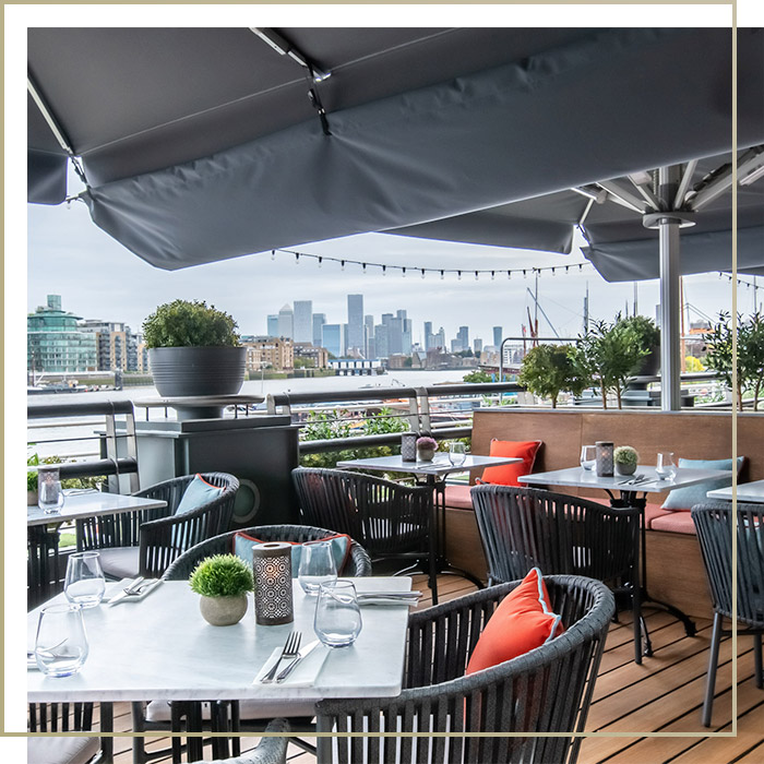 Outdoor restaurant seating at Browns Butlers Wharf
